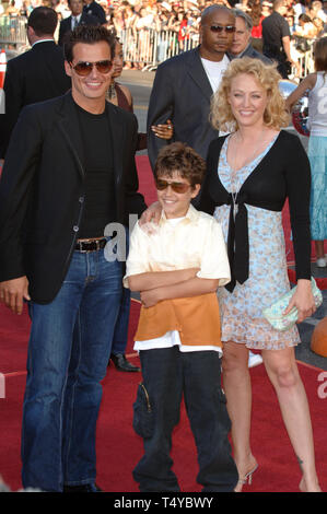 LOS ANGELES, CA. June 27, 2005: Actress VIRGINIA MADSEN & actor ANTONIO SABATO JR & their son at the special fan screening of War of the Worlds at the Grauman's Chinese Theatre, Hollywood. © 2005 Paul Smith / Featureflash Stock Photo