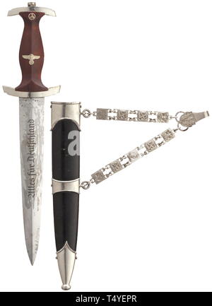 A service dagger M 36 with chain hanger Eickhorn blade with etched devices and RZM logo (M 7/66 1939), the nickelplating faded in places. Nickel-plated grip fittings, brown wood grip with inlaid nickel silver eagle and enamelled SA emblem. Black painted steel scabbard (faded), nickel-plated fittings. Iron chain hanger, nickel-plated, reverse stamped 'A' and 'RZM 5/8' as well as 'Musterschutz NSKK-Korpsführung'. Length ca. 37.5 cm. Rare. historic, historical, organisation, organization, organizations, organisations, 20th century, Editorial-Use-Only Stock Photo