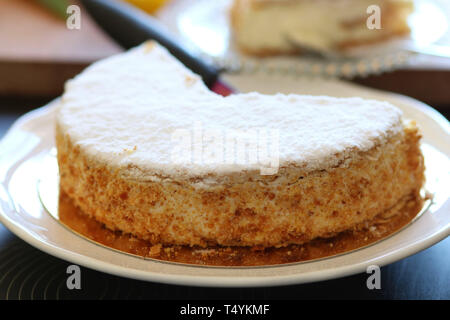 Homemade sweet concept. Delicious puff pastry cake with Chantilly cream. Stock Photo