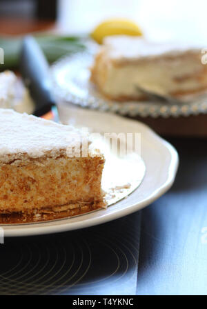 Homemade sweet concept. Delicious puff pastry cake with Chantilly cream. Stock Photo