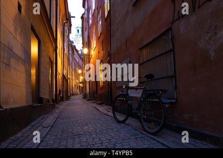 Stockholm, Sweden - March 15, 2016: Antique bicycle parked in one of the streets in the old town of the city. Stock Photo