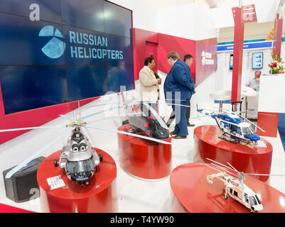 Bengaluru, India - February 22, 2019: Visitors at the Russian helicopter stall at the Aero India 2019 exhibition in Bangalore, India. Aero India is a  Stock Photo