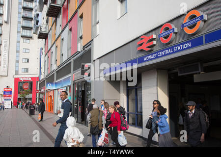 Wembley Central Station entrance on High Road, Wembley busy with pedestrians. Stock Photo