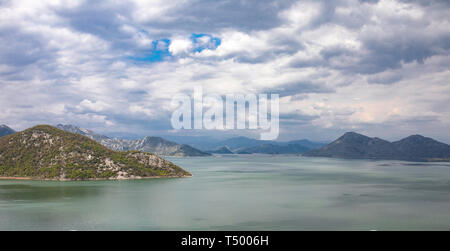 Lake Skadar - cloudy sky and the mountains. Montenegro. Stock Photo