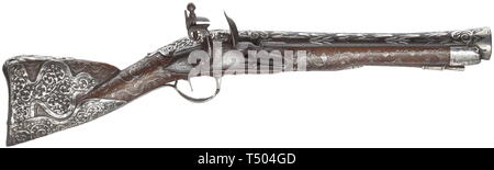 An Ottoman silver-mounted flintlock blunderbuss, 19th century. Round, funnel-shaped barrel with rich silver inlays on top and smith's mark at the breech. Slightly engraved (somewhat pitted) flintlock. Walnut stock profusely inlaid with silver wire and ornamentally embossed silver fittings as well as an implied silver ramrod. Length 54 cm. historic, historical, Ottoman, Orient, Oriental, Asia, Asian, 19th century, Additional-Rights-Clearance-Info-Not-Available Stock Photo
