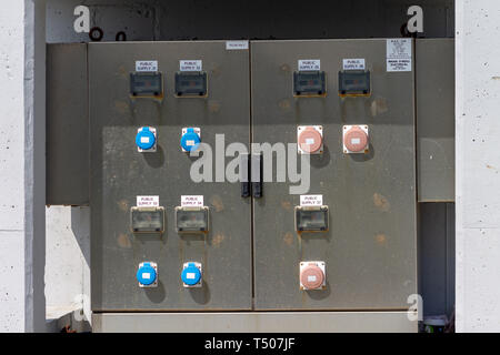 Industrial sockets and plug on distribution board. Construction site ...