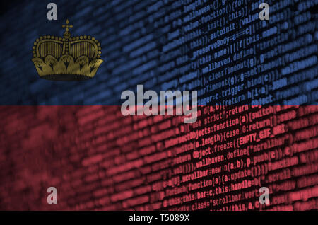 Liechtenstein flag  is depicted on the screen with the program code. The concept of modern technology and site development. Stock Photo