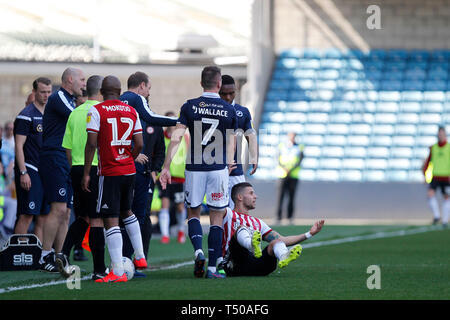 London, UK. 19th Apr, 2019. Emiliano Marcondes of Brentford appears to fall during the EFL Sky Bet Championship match between Millwall and Brentford at The Den, London, England on 19 April 2019. Photo by Carlton Myrie. Editorial use only, license required for commercial use. No use in betting, games or a single club/league/player publications. Credit: UK Sports Pics Ltd/Alamy Live News Stock Photo