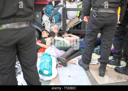 Parliament Square, London, UK. 19th Apr, 2019. Police clear environmental protesters from Oxford Circus. Credit: Penelope Barritt/Alamy Live News Stock Photo