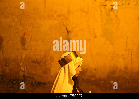 Almazan, Soria, Spain. 19th Apr 2019. A penitent is seen during the procession of 'Viernes Santo' (Good Friday) in Soria, north of Spain.More than one billion Christian across the world mark the Holy Week of Easter in celebration of the crucifixion and resurrection of Jesus Christ. Credit: John Milner/SOPA Images/ZUMA Wire/Alamy Live News Stock Photo