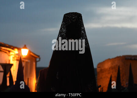 Almazan, Soria, Spain. 19th Apr 2019. A penitent is seen during the procession of 'Viernes Santo' (Good Friday) in Soria, north of Spain.More than one billion Christian across the world mark the Holy Week of Easter in celebration of the crucifixion and resurrection of Jesus Christ. Credit: John Milner/SOPA Images/ZUMA Wire/Alamy Live News Stock Photo