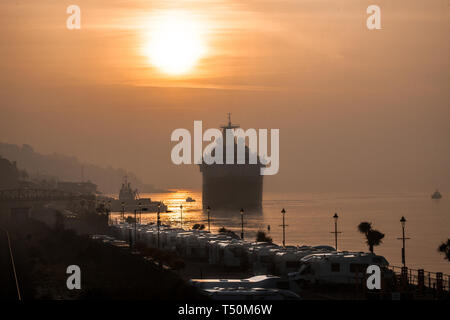 Cobh, Cork, Ireland. 20th April, 2019. Cruise liner Saga Sapphire arrives in Cobh, Co. Cork just after sunrise for a short visit to the coastal town. Credit: David Creedon/Alamy Live News Stock Photo