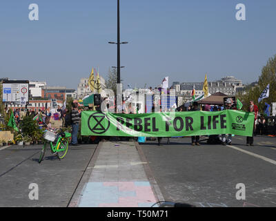 London, UK. 20th Apr, 2019. Extinction Rebellion protesters still camped on Waterloo Bridge as police look on Credit: Stock Photo