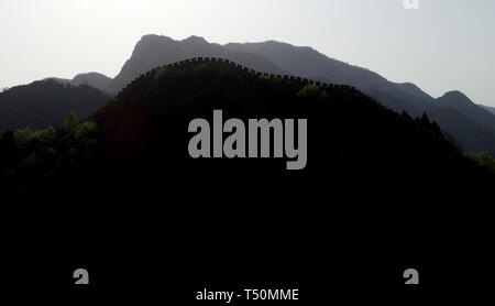 (190420) -- TIANJIN, April 20, 2019 (Xinhua) -- Photo taken on April 19, 2019 shows the Huangyaguan Great Wall in the northern suburb of Tianjin, north China. The Huangyaguan Great Wall was built more than 14 centuries ago for border defense purpose. The structure winds its way for about 3,000 meters along the mountain areas of today's Jizhou District on the outskirts of Tianjin. (Xinhua/Yue Yuewei) Stock Photo