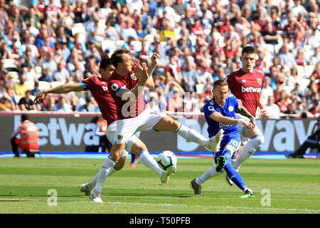 London, UK. 20th Apr, 2019. James Maddison of Leicester City (10) takes a shot at goal. Premier League match, West Ham United v Leicester City at the London Stadium, Queen Elizabeth Olympic Park in London on Saturday 20th April 2019. this image may only be used for Editorial purposes. Editorial use only, license required for commercial use. No use in betting, games or a single club/league/player publications . pic by Steffan Bowen/Andrew Orchard sports photography/Alamy Live news Credit: Andrew Orchard sports photography/Alamy Live News