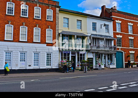 This pair of buildings in the High Street are occupied by Browns Home Hardware and Ogles Spa Hair & Beauty Salon Attractive Edwardian iron balconies. Stock Photo