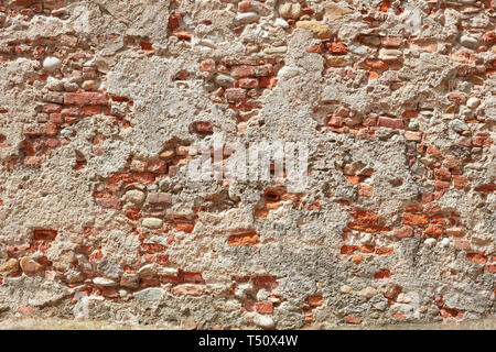 Old bricks and concrete wall texture background, sunlight Stock Photo