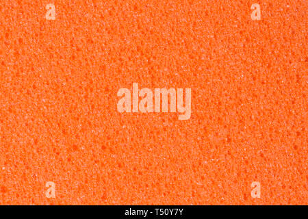 Effective saturated peach colour foam EVA texture. Can be used as background. Stock Photo