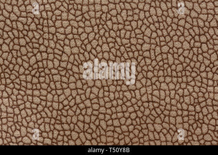Mottled brown textile texture. Can be used as background. Stock Photo