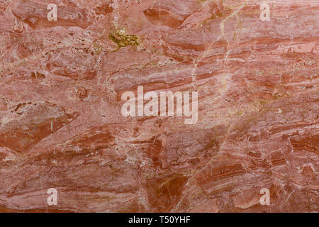 Red marble background close up, detail texture. Stock Photo