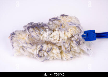 super dirty feather duster on white background Stock Photo