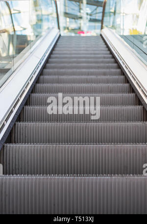 Empty escalator perspective from up to down Stock Photo