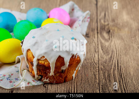 Easter symbols cake and painted eggs with still life Stock Photo
