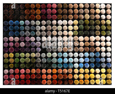Overhead background texture of multicolored thick velvety pile in moquette textile forming a circular background texture and pattern Stock Photo