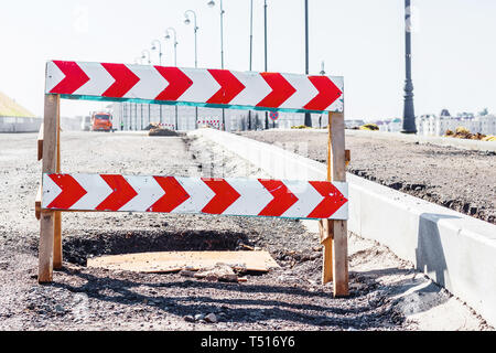 Road closed sign before the road repair. Road works are underway Stock Photo