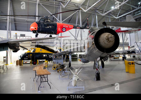 American Air Museum at Duxford Imperial War Museum,Cambridgeshire, England. English Electric Lightning F.1,Westland Whirlwind HAS.7 Stock Photo