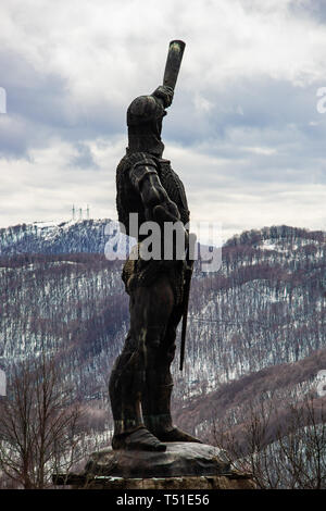 03 APRIL 2019, GEORGIA, TBILISI, Famous Didgori battle monument with giant swards and sculptures of soldiers close to Tbilisi in Caucasus mountain ran Stock Photo