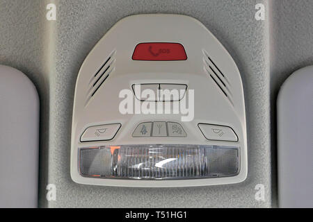 SOS button on the car panel. Luxury car interior Stock Photo