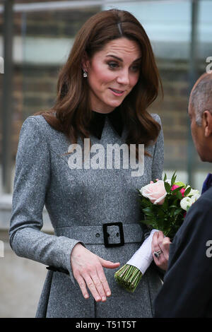 Catherine Duchess of Cambridge departs the Children's Foundling Museum wearing a Catherine Walker outfit with a Mulberry clutch purse and Gianvito Rossi block heels  Featuring: Catherine Duchess of Cambridge, Kate Middleton Where: London, United Kingdom When: 19 Mar 2019 Credit: WENN.com Stock Photo