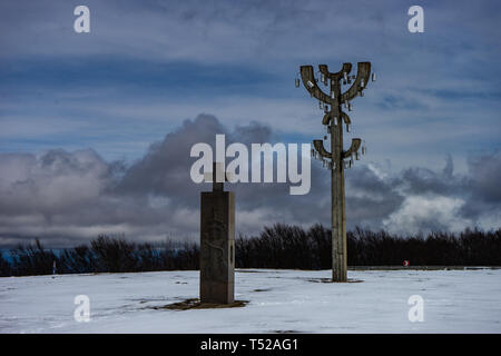 03 APRIL 2019, GEORGIA, TBILISI, Famous Didgori battle monument with giant swards and sculptures of soldiers close to Tbilisi in Caucasus mountain ran Stock Photo