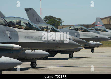 Four U.S. Air Force F-16 Falcons assigned to the 100th Fighter Squadron, 187th Fighter Wing, Alabama Air National Guard prepare for an afternoon training flight at the Air Dominance Center at the Savannah Air National Guard Base, Savannah, Georgia, April 16, 2019. The 187th is taking part in Sentry Savannah 2019-2, a two-week Air-to-Air Combat Training exercise preparing Air National Guard units for deployment and downrange theatre operations. (U.S. Air National Guard photo by Master Sgt. John Hughel, 142nd Fighter Wing Public Affairs)