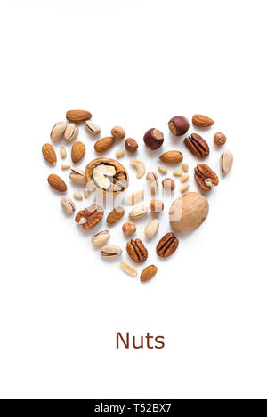 Nuts in shape of Heart isolated on white. Various nuts (almonds, pistachios, pecans, hazelnuts, pine nuts, peanuts). Stock Photo