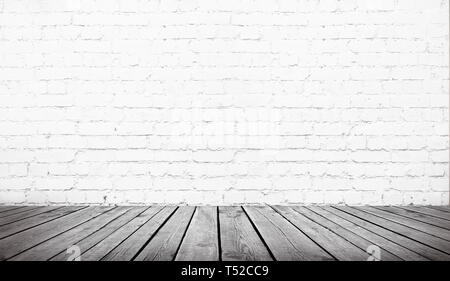 table over white brick wall background, template Stock Photo