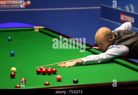 Luca Brecel during day one of the 2019 Betfred World Championship at The Crucible, Sheffield. Stock Photo