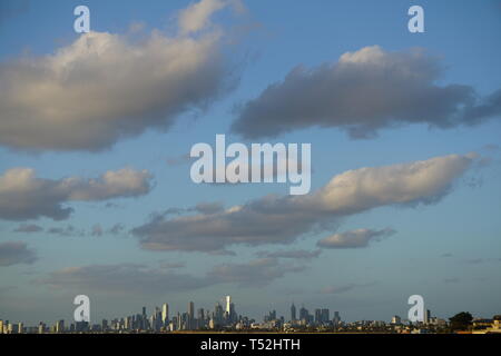 Melbourne City and the sky above from Brighton Beach. Stock Photo