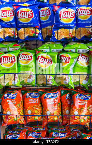 Colorful packaging of the top chip FMCG brands in indian retail stores  Stock Photo