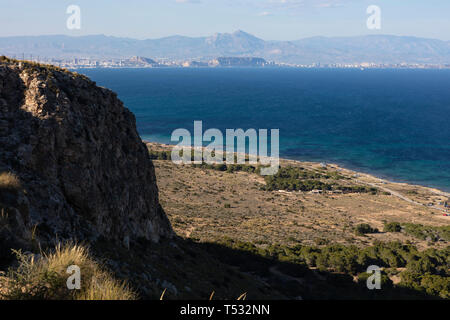 panoramic view of the coast with the city of Alicante, its castle and the Aitana mountain in the background. Photo taken from lighthouse Stock Photo