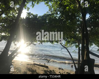 Sunset in Kalibobo Beach Nabire Papua Indonesia, i capture when jogging and watch that moment. Stock Photo