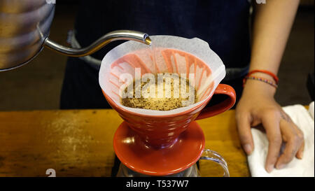 Close-up of brewing coffee process at a specialty coffee shop. Stock Photo
