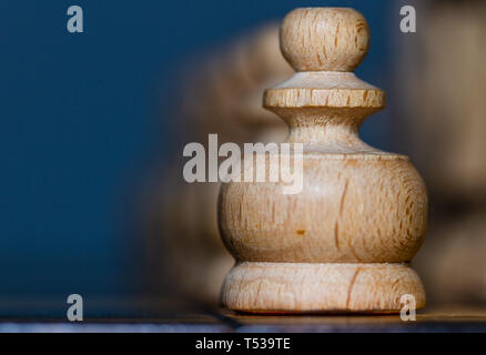 Chess, royal strategy game. Wooden figures and pawns. Stock Photo