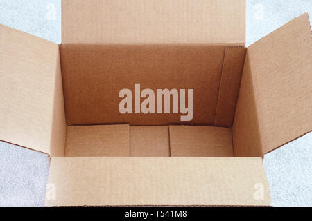 Open cardboard box. Close up. Stock Photo