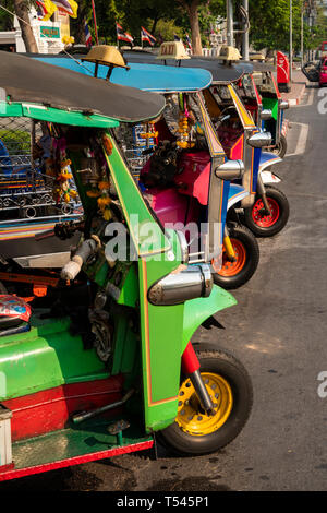 Thailand, Bangkok, Na Phra That Alley, line of tuk tuk auto rickshaws outside National Museum Stock Photo