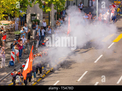 Zurich, Switzerland - August 1, 2018: participants of the parade devoted to the Swiss National Day shooting to signal the start of the parade. The Swi Stock Photo