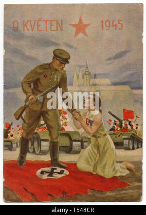 Red Army soldier and a kneeling Czechoslovak girl in liberated Prague on 9 May 1945 depicted in the Czechoslovak vintage postcard by Czech artist Otto Ušák issued in 1945. Courtesy of the Azoor Postcard Collection. Stock Photo