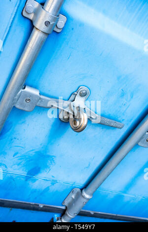 Steel door secured with padlock Stock Photo