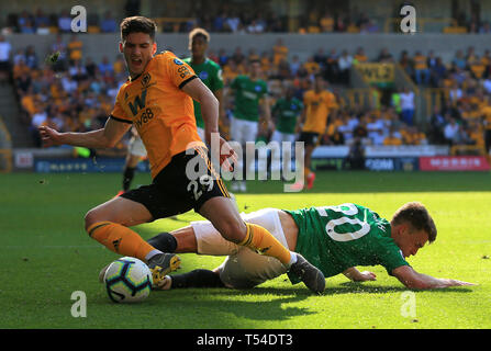 Wolverhampton, UK. 20th Apr, 2019. Ruben Vinagre of Wolverhampton Wanderers is fouled by Solly March of Brighton and Hove Albion Credit: Paul Roberts/OneUpTop/Alamy Live News